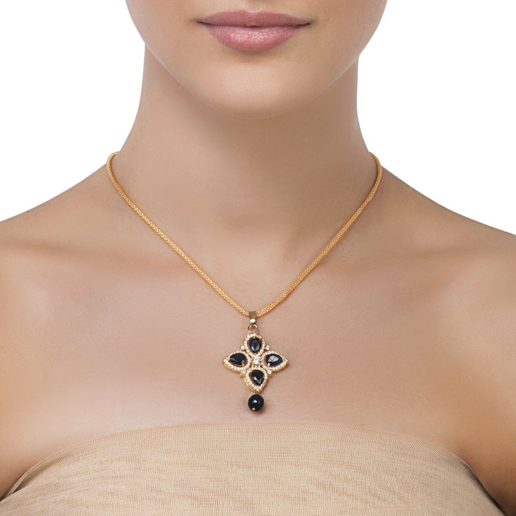 FINE IOLITE FLOWER PENDANT